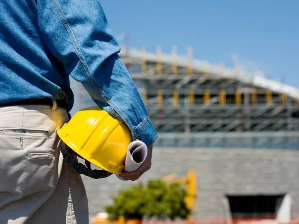 construction-worker-at-construction-site-with-hard-hat_123251